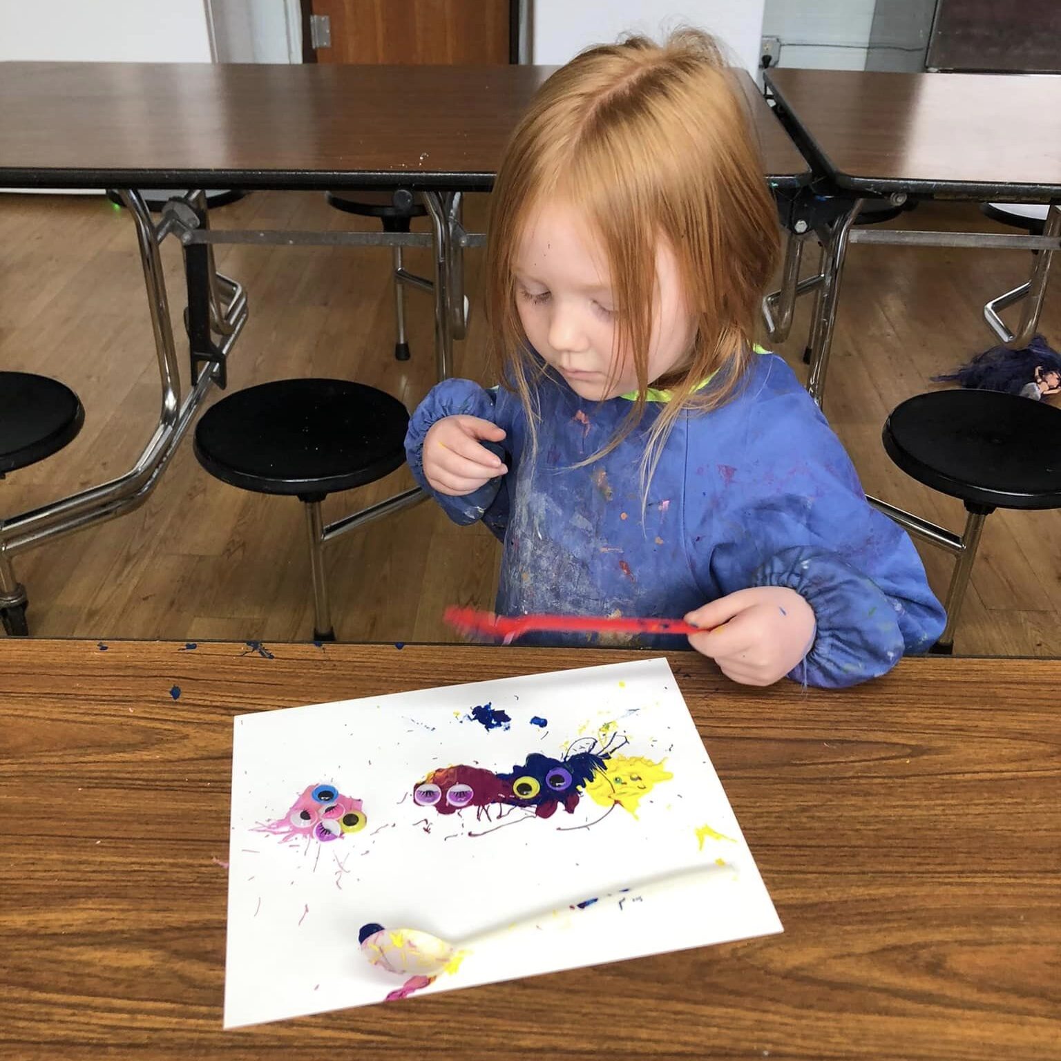 Hazel's paints a picture using her favorite colors.