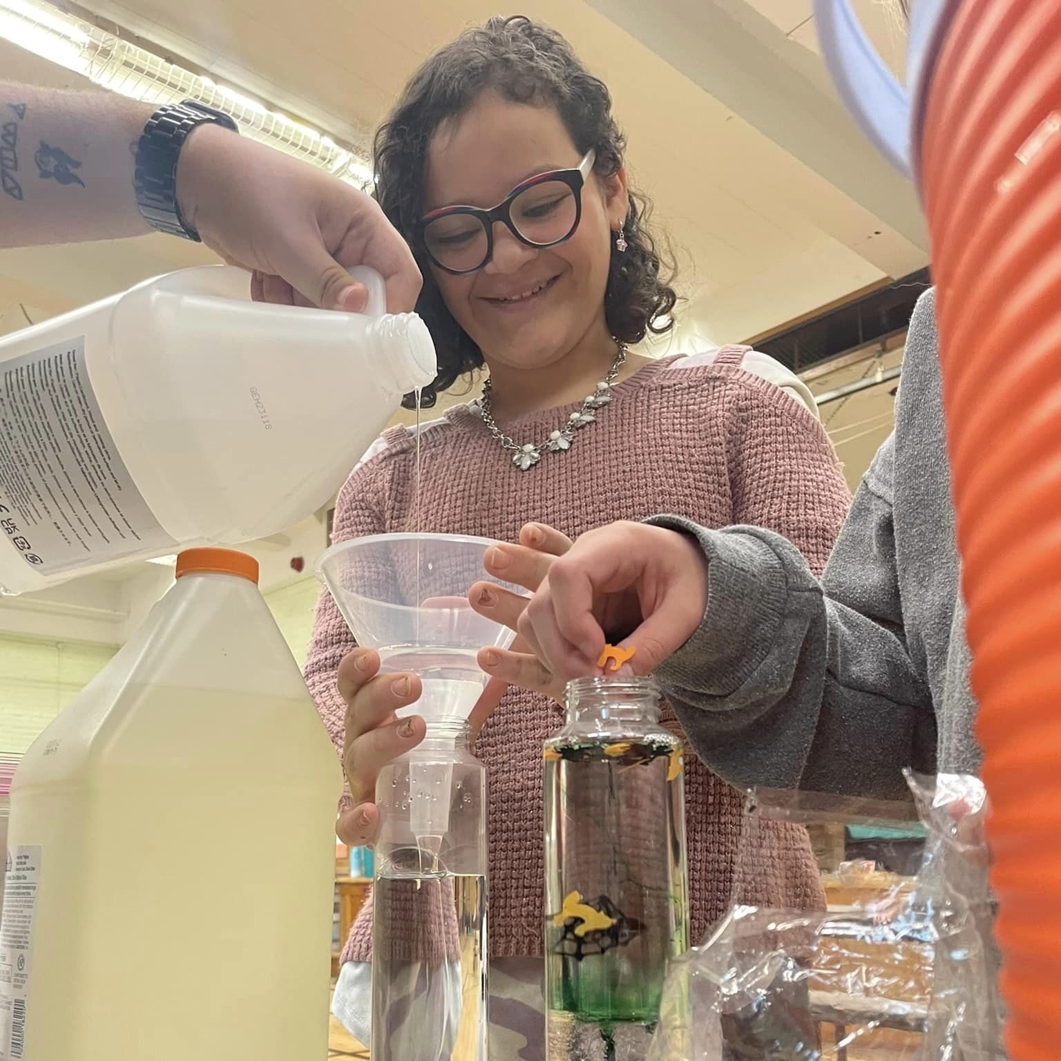 MJ conducts a science experiment.